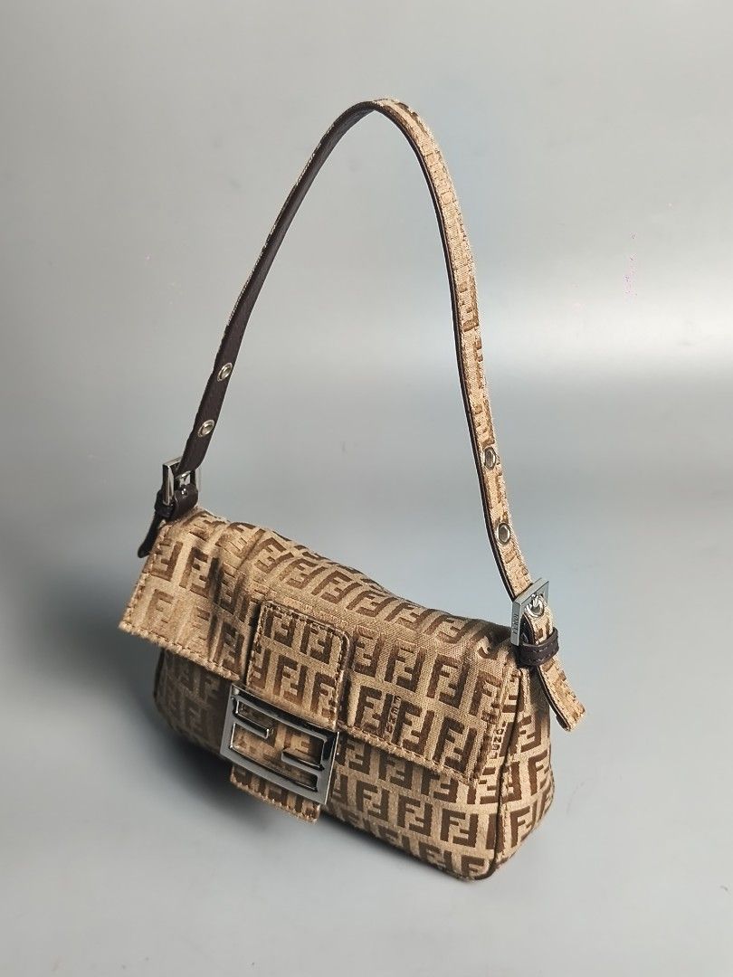 Fendi Zucchino Mini Baguette (Category: Luxury Bags & Wallets) located in Bulacan. Submitted by 4kcollection (Listing ID 1437078456, Image 3). Description: Fendi Zucchino Mini Baguette Pre-loved from Japan 🇯🇵 Very Good Condition Size: Small Ff Zipper No Code No Flaws No Inclusion Dm for sure buyer 📩 MOP: Gcash / Maya / BPI Courier: J&t / Lbc / Lalamove Location: SJDM Bulacan.