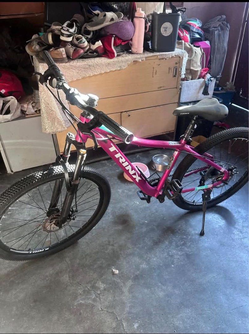 FOR SALE TRINX N106 (Category: Bicycles) located in Manila. Submitted by zeenamon (Listing ID 1437193931, Image 2). Description: Trinx N106 Lady MTB 26” Only P7,800, slightly nego if sure buyer FRAME: TRIN Alloy 26’*15.5’ FORK: Mechanical Lock-Out Suspension, Travel: 100MM SHIFTER: SHIMANO ST-EF500 FD: TRINX FD-QD-35 RD: SHIMANO TZ500 CASSETTE: 7S, 14-28T CHAIN: M30 7S BRAKE: TRINX Alloy Mechanical Disc RIM: TRINX Alloy Double Wall TYRE: CST 26”*