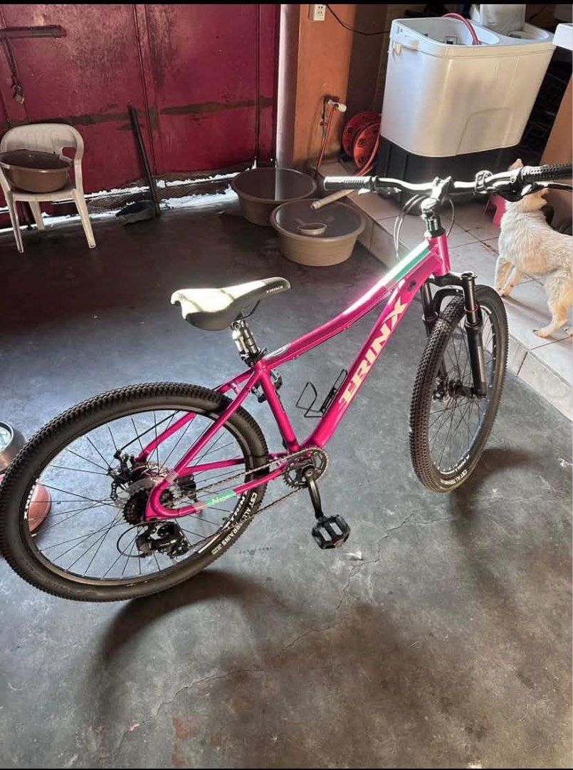 FOR SALE TRINX N106 (Category: Bicycles) located in Manila. Submitted by zeenamon (Listing ID 1437193931, Image 3). Description: Trinx N106 Lady MTB 26” Only P7,800, slightly nego if sure buyer FRAME: TRIN Alloy 26’*15.5’ FORK: Mechanical Lock-Out Suspension, Travel: 100MM SHIFTER: SHIMANO ST-EF500 FD: TRINX FD-QD-35 RD: SHIMANO TZ500 CASSETTE: 7S, 14-28T CHAIN: M30 7S BRAKE: TRINX Alloy Mechanical Disc RIM: TRINX Alloy Double Wall TYRE: CST 26”*