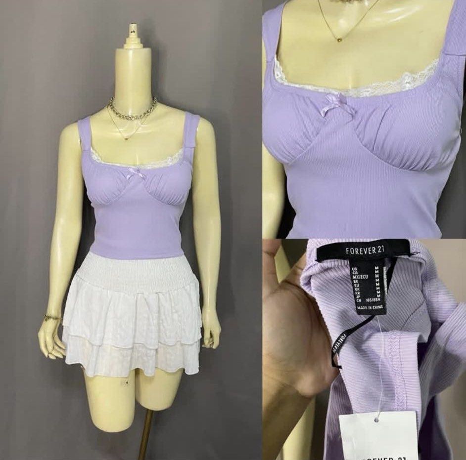 Forever 21 Lilac Ribbed Camisole (Category: Sleeveless) located in Manila. Submitted by threshold01 (Listing ID 1437151297, Image 1). Description: BNWOT (i removed the tag to wash it) Ready to wear Forever 21 lilac ribbed camisole featuring a lace trim square neckline Small size.