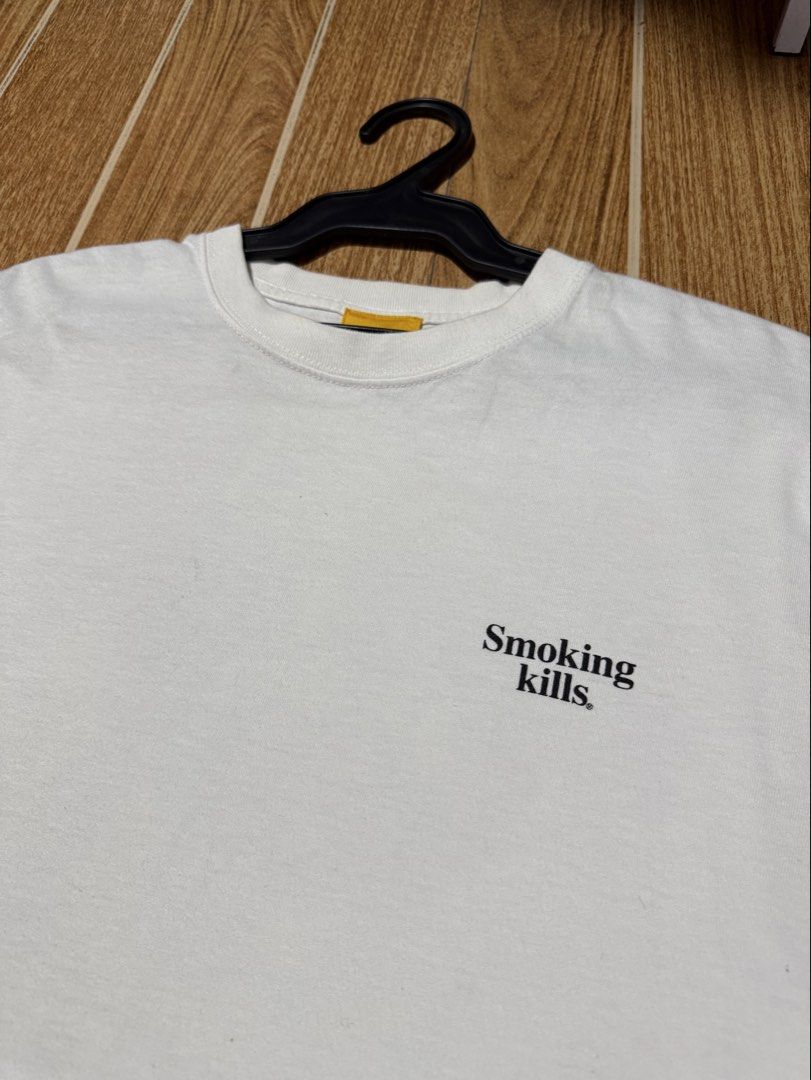 FR2 Smoking Kills T-shirt (Category: Tshirts & Polo Shirts ) located in Manila. Submitted by mjaothrift (Listing ID 1437167617, Image 2). Description: - FR2 T-shirt - Features the iconic "Smoking Kills" logo - Small rabbit logo detail - Color: White - Size: M - Style: Crew neck, short sleeves.