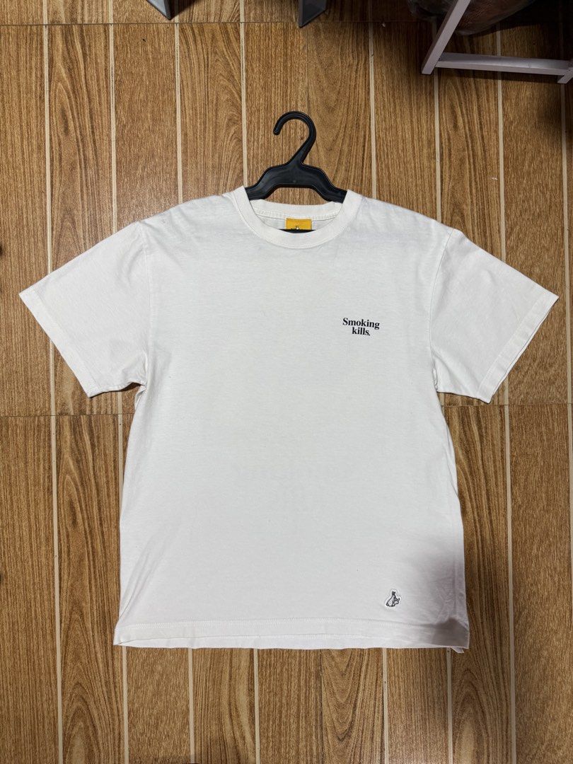 FR2 Smoking Kills T-shirt (Category: Tshirts & Polo Shirts ) located in Manila. Submitted by mjaothrift (Listing ID 1437167617, Image 1). Description: - FR2 T-shirt - Features the iconic "Smoking Kills" logo - Small rabbit logo detail - Color: White - Size: M - Style: Crew neck, short sleeves.
