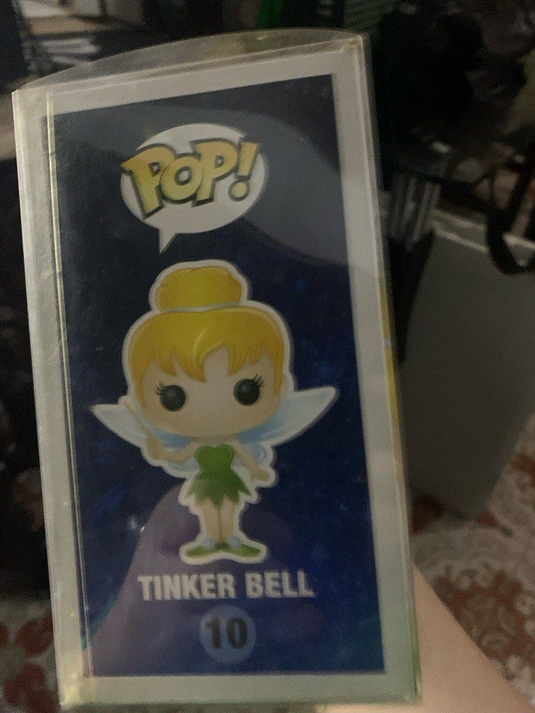 Funko Pop! Disney Tinker Bell #10 (Category: Designer & Blind Box Toys) located in Manila. Submitted by robertzombie (Listing ID 1437167350, Image 1). Description: - Funko Pop! figure of Tinker Bell - From Disney - Series 1, #10 - Includes original packaging - Box features Funko Pop! and Disney logos - Back of box shows other characters from the series 09153896941 f1.