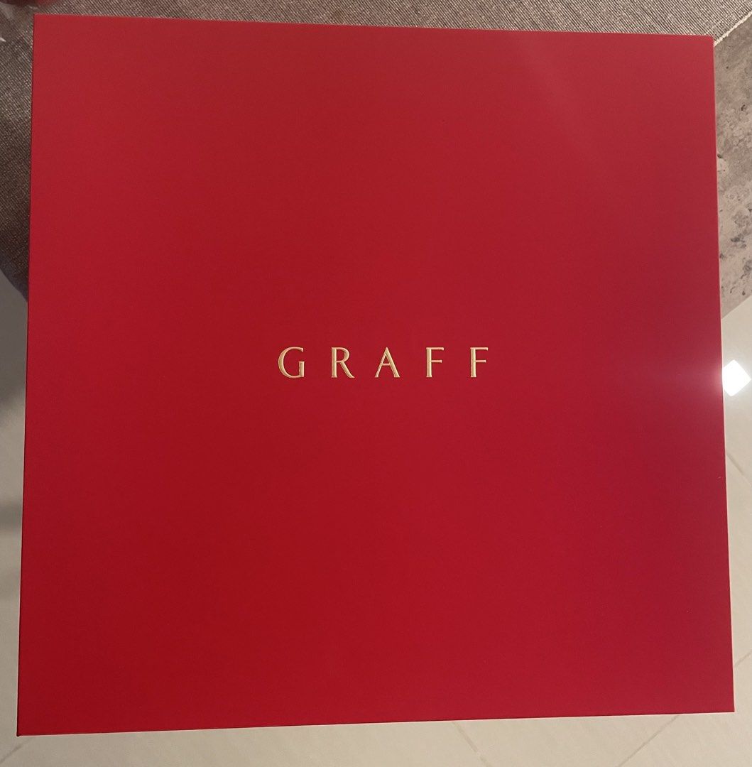 Graff Serving Set - Authentic (Category: Dinnerware & Cutlery) located in Singapore. Submitted by FinestFinds86 (Listing ID 1437076561, Image 1). Description: - Brand new Graff serving set. - Includes: - 2 Serving Bowls - 2 Smaller Serving Dishes - Red Box - 2 Red Packets (Horse Design) - Perfect for gifts or home use..