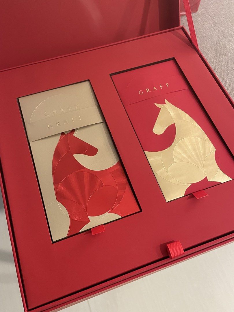 Graff Serving Set - Authentic (Category: Dinnerware & Cutlery) located in Singapore. Submitted by FinestFinds86 (Listing ID 1437076561, Image 2). Description: - Brand new Graff serving set. - Includes: - 2 Serving Bowls - 2 Smaller Serving Dishes - Red Box - 2 Red Packets (Horse Design) - Perfect for gifts or home use..