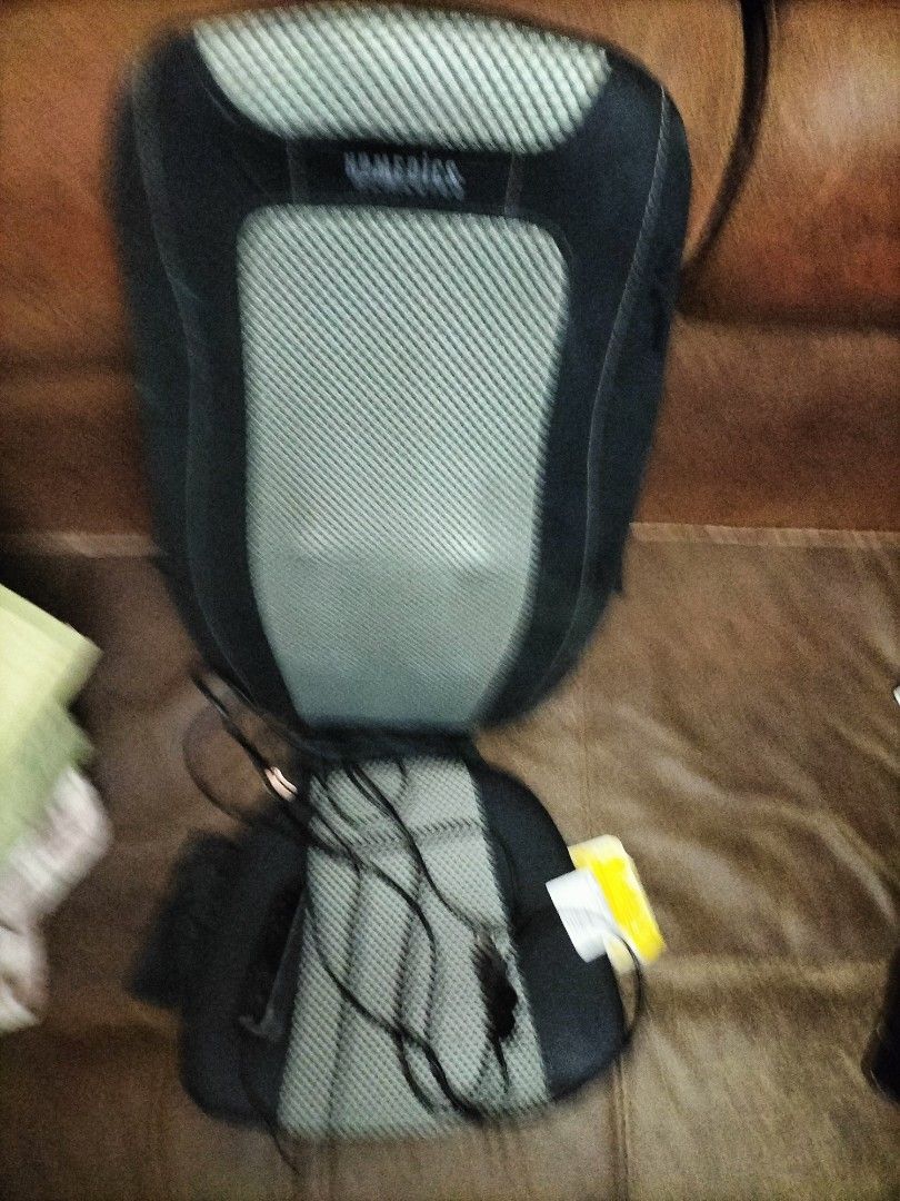 HoMedics Massage Seat (Category: Massage Devices) located in Cainta. Submitted by banzvi73 (Listing ID 1437048649, Image 3). Description: - HoMedics massage seat - Black and gray design - Includes remote control - Mesh-like texture on back and seat - Suitable for car or home use - Comes with power cord and car adapter.