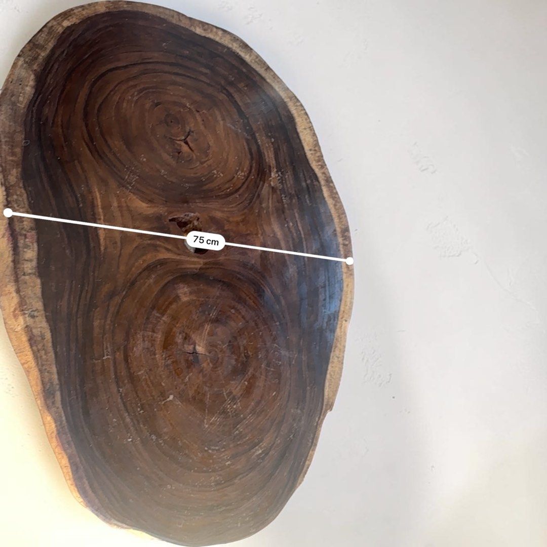 Huge Coffee table using Live Edge Wooden Top (Category: Tables & Sets) located in Pasig City. Submitted by casambhomedecors (Listing ID 1437208557, Image 3). Description: - Live edge wooden table - Approximately 1 meter long - 75 cm wide - Features a natural edge - Rich, dark wood grain - Supported by metal legs - Ideal for living rooms or accent pieces.