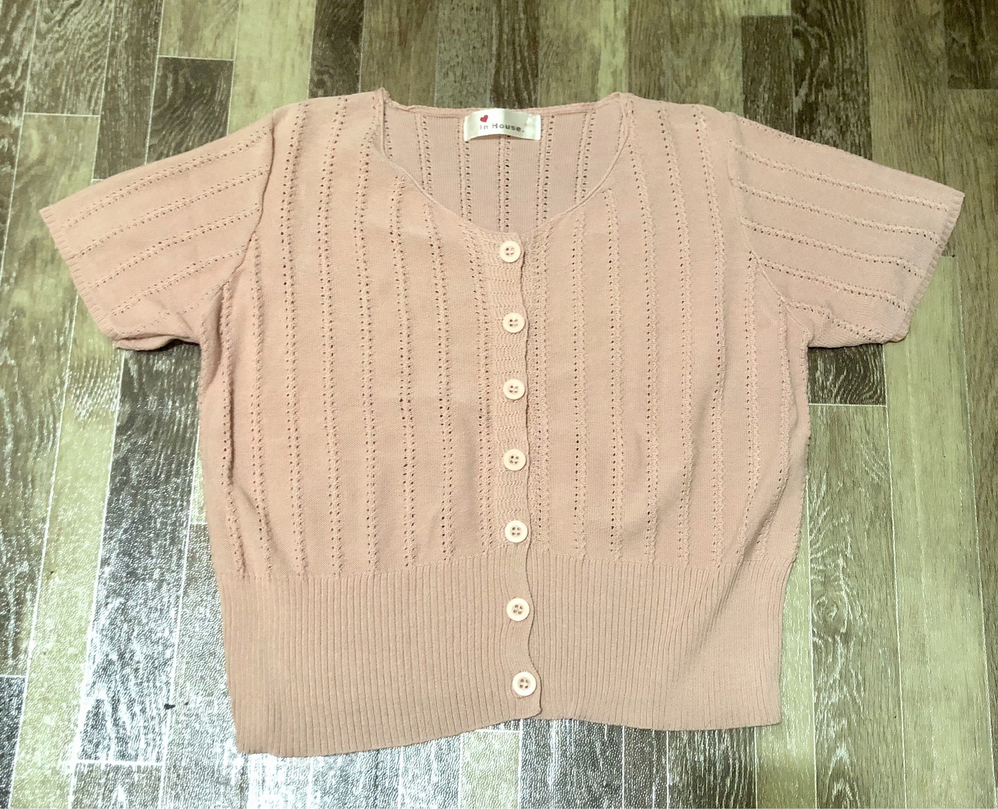 In House Pink Cardigan (Category: Coats, Jackets and Outerwear) located in Manila. Submitted by tonettesells (Listing ID 1437173240, Image 1). Description: - Brand: In House - Color: Soft, muted pink - Style: Cardigan - Features: Button-down front, short sleeves, round neckline - Details: Delicate knit pattern, ribbed hem - Material: Lightweight.