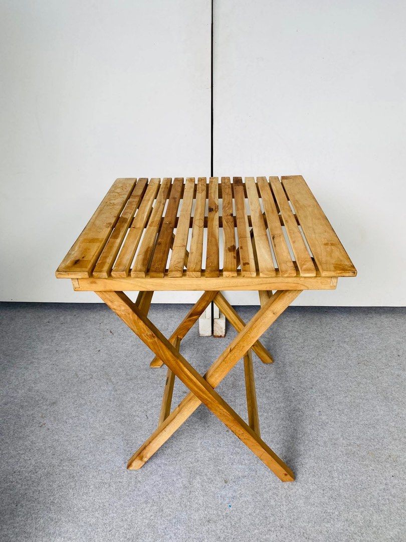“JAPAN SURPLUS” FOLDING DINING TABLE SOLID WOOD SPACE SAVER (Category: Tables & Sets) located in Bulacan. Submitted by monmon555 (Listing ID 1437144267, Image 1). Description: “JAPAN SURPLUS” FOLDING DINING TABLE SOLID WOOD SPACE SAVER SIZE: 23.5L” x 23.5W” x 29.5H” inches (AS-IS ITEM) IN GOOD CONDITION.