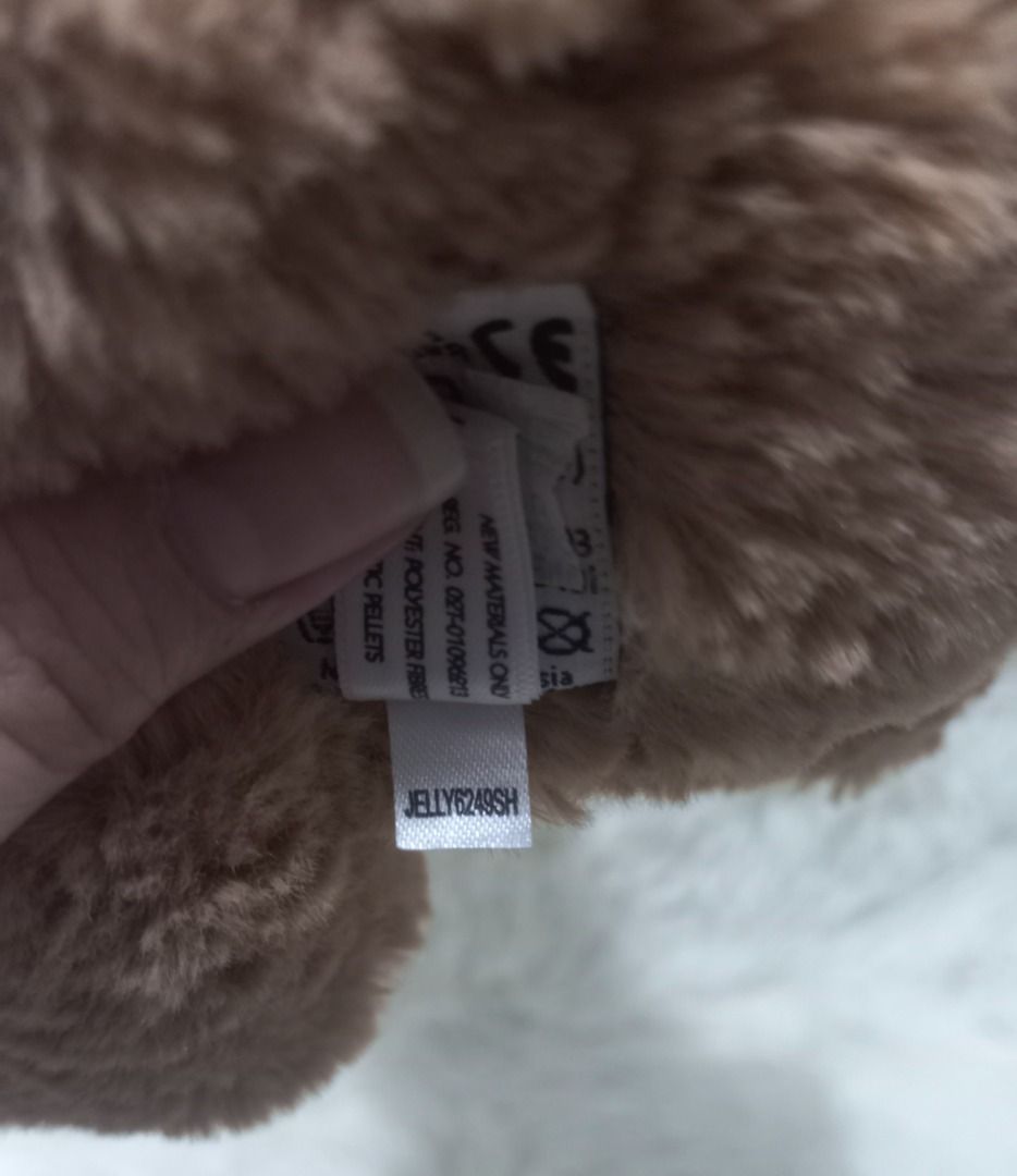 Jellycat Brown Teddy Bear Plush Toy (Category: Plushies & Soft Toys) located in Taguig. Submitted by phlercollections (Listing ID 1437140223, Image 2). Description: - Cute brown teddy bear design. - Soft and cuddly plush material. - Classic teddy bear features: round head, small ears, cute nose. - Ideal gift for kids and teddy bear lovers..