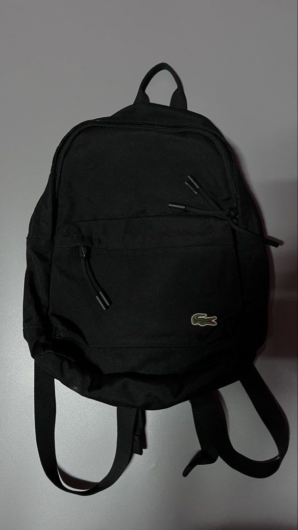 LACOSTE BAG (Category: Backpacks) located in Cebu City. Submitted by markmeta213 (Listing ID 1437031163, Image 1). Description: AUTHENTIC BACKPACK EXCELLENT CONDITION RFS: SMALL FOR ME.