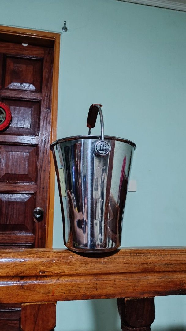 Laurent-Perrier Champagne Ice Bucket (Category: Other Kitchenware & Tableware) located in Taguig. Submitted by redarmy21775000 (Listing ID 1437154527, Image 3). Description: - Laurent-Perrier ice bucket - Stainless steel body - Brown leather handle with embossed brand name - Gold-colored label - Perfect for champagne and other beverages - Classic design.