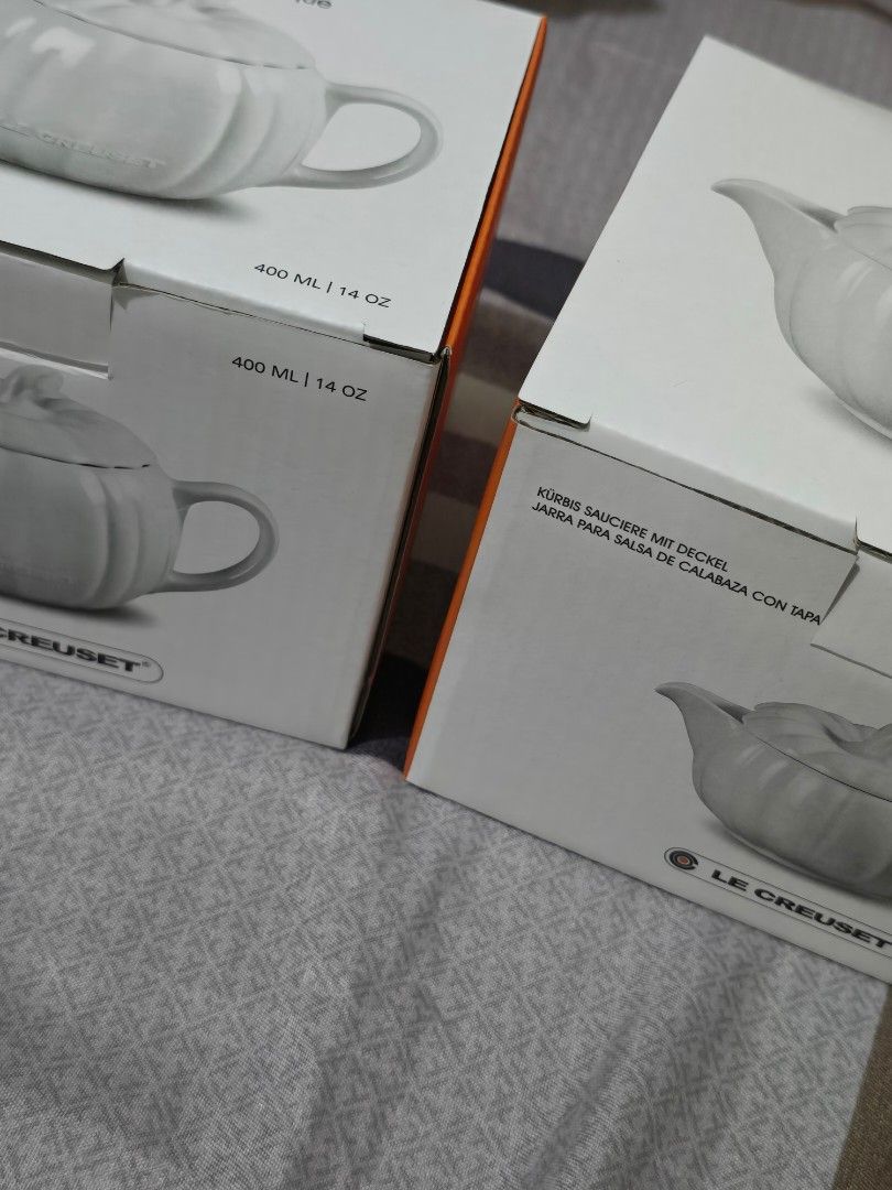 Le Creuset Mug and Gravy Pot Set (Category: Coffee & Tea Tableware) located in Marikina City. Submitted by concuorebianco (Listing ID 1437115087, Image 3). Description: - Brand new Le Creuset mug and gravy pot - Eye-catching orange color - Adorable pumpkin shape - Includes lid with stem-shaped handle - Convenient pouring spout - 400 ml / 14 oz capacity - Comes with original box.