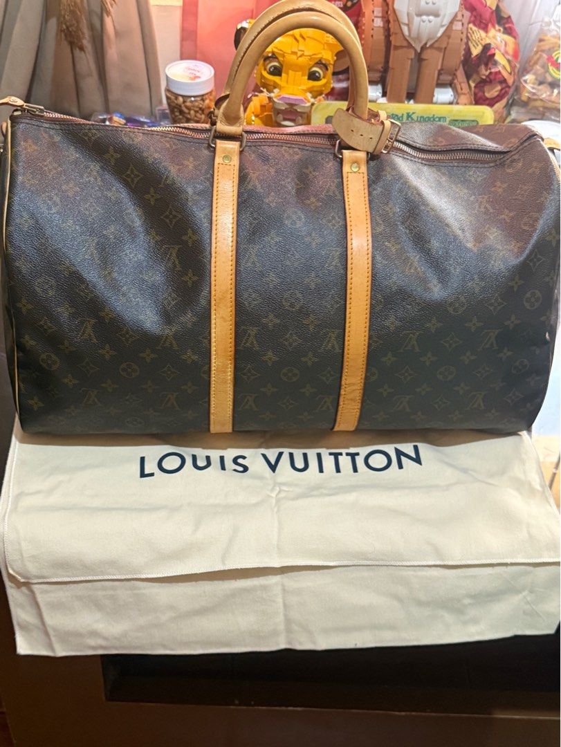 Louis Vuitton Monogram Canvas Keepall 55 With Lock & Key (Category: Luxury Bags & Wallets) located in Paranaque City. Submitted by lyn0618 (Listing ID 1436747983, Image 1). Description: FOR SALE! AUTHENTIC! PERSONAL PRE LOVED LOUIS VUITTON KEEPALL CLASSIC MONOGRAM SIZE 55 WITH OG LLV LOCK & KEY ORIGINAL LV DUST BAG INCLUDED ECLAIR ZIPPER SEE PHOTO SIZE 55. HEAT STAMP ON THE LEAF PEASE SEE ALL DETAILED PJOTO. PLEASE MANAGE YOUR EXPECTATIONS WHEN B