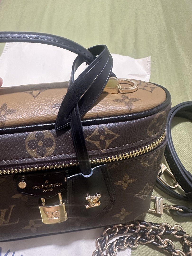 NEW Louis Vuitton Vanity PM Monogram (Category: Luxury Bags & Wallets) located in Navotas City. Submitted by lexituscano (Listing ID 1437068116, Image 2). Description: - Authentic Louis Vuitton Vanity PM handbag - Monogram canvas - Top handle - Removable chain strap - Removable leather strap - Padlock and key included - Black fabric lining - Dust bag included - Gold-tone hardware - Zip closure.