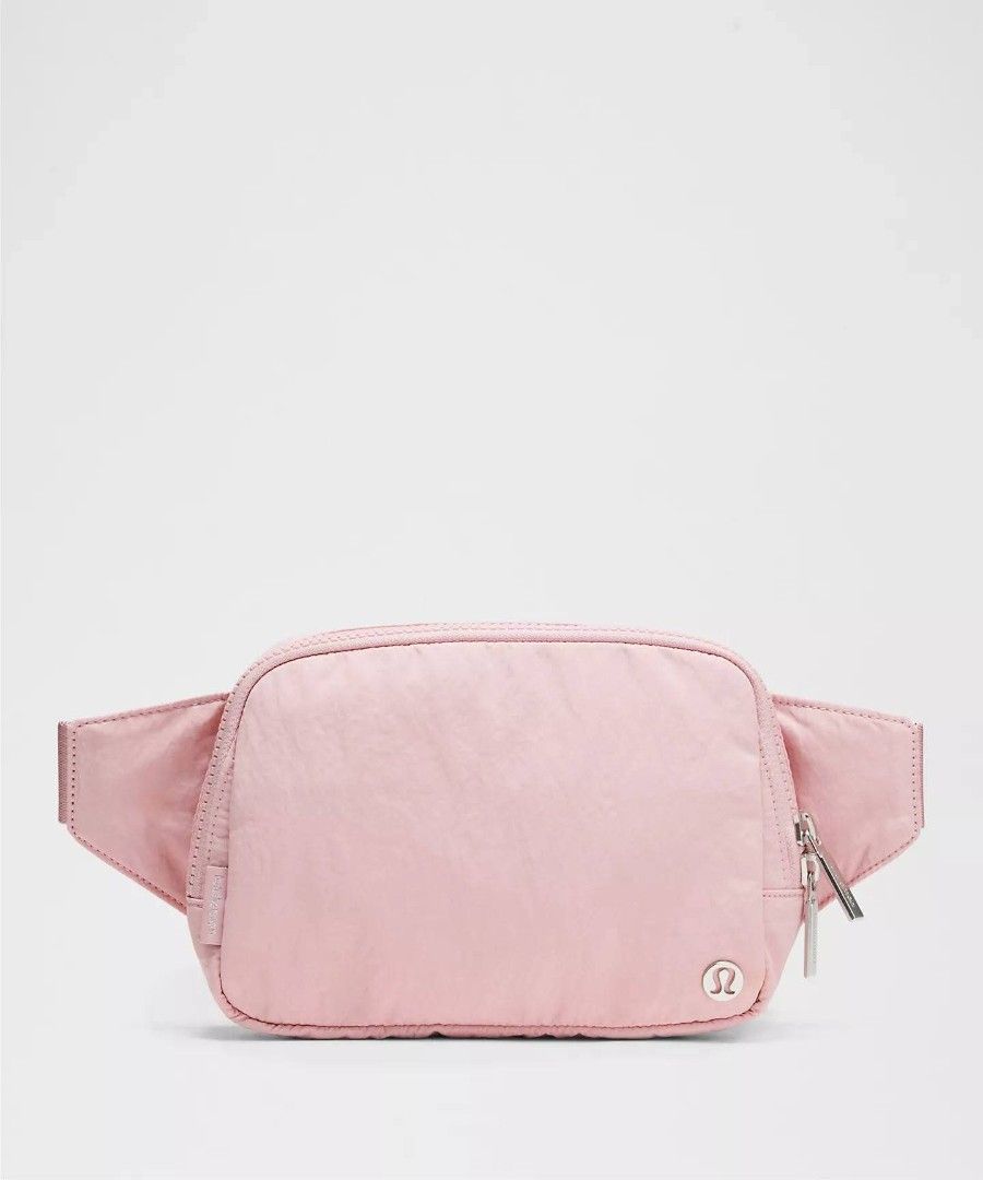 Lululemon Everywhere 2L Belt Bag - Pink (Category: Cross-body Bags) located in Mandaluyong City. Submitted by dainxxx (Listing ID 1437186561, Image 1). Description: - Lululemon Everywhere Belt Bag - Stylish and practical design - Zippered main compartment - Adjustable strap for a comfortable fit - Exterior pocket for easy access - Sleek, minimalist aesthetic - Perfect for carrying essentials - Color: Light pink.