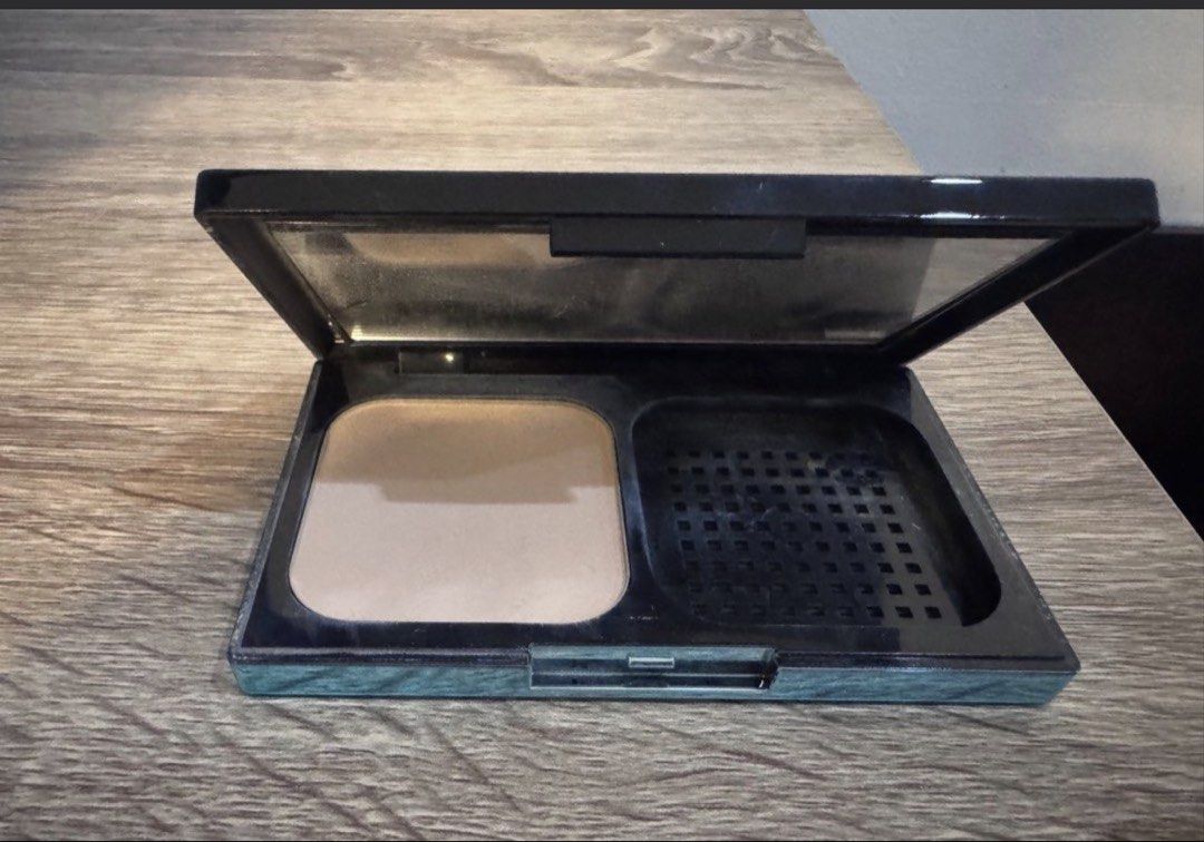 Maybelline Fit Me Powder (Category: Makeup) located in Manila. Submitted by decluterthings888 (Listing ID 1437202518, Image 3). Description: - Maybelline Fit Me powder compact - Light beige shade - Includes mirror - Features a compartment for sponge/applicator - Black compact with white and blue Fit Me logo - Maybelline New York logo visible.