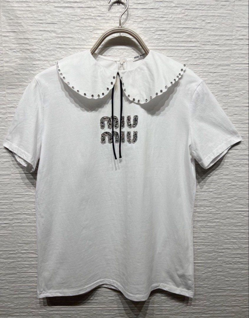▪️Miu Miu w/rhinestone White Tee Shirt (Category: Luxury Apparel) located in Makati City. Submitted by aveltot_rig (Listing ID 1436095551, Image 3). Description: Item: Miu Miu w/rhinestone White Tee Shirt Dimes: width: 21 x length: 26 📏 Condition: good condition only! ✨issue last photo.