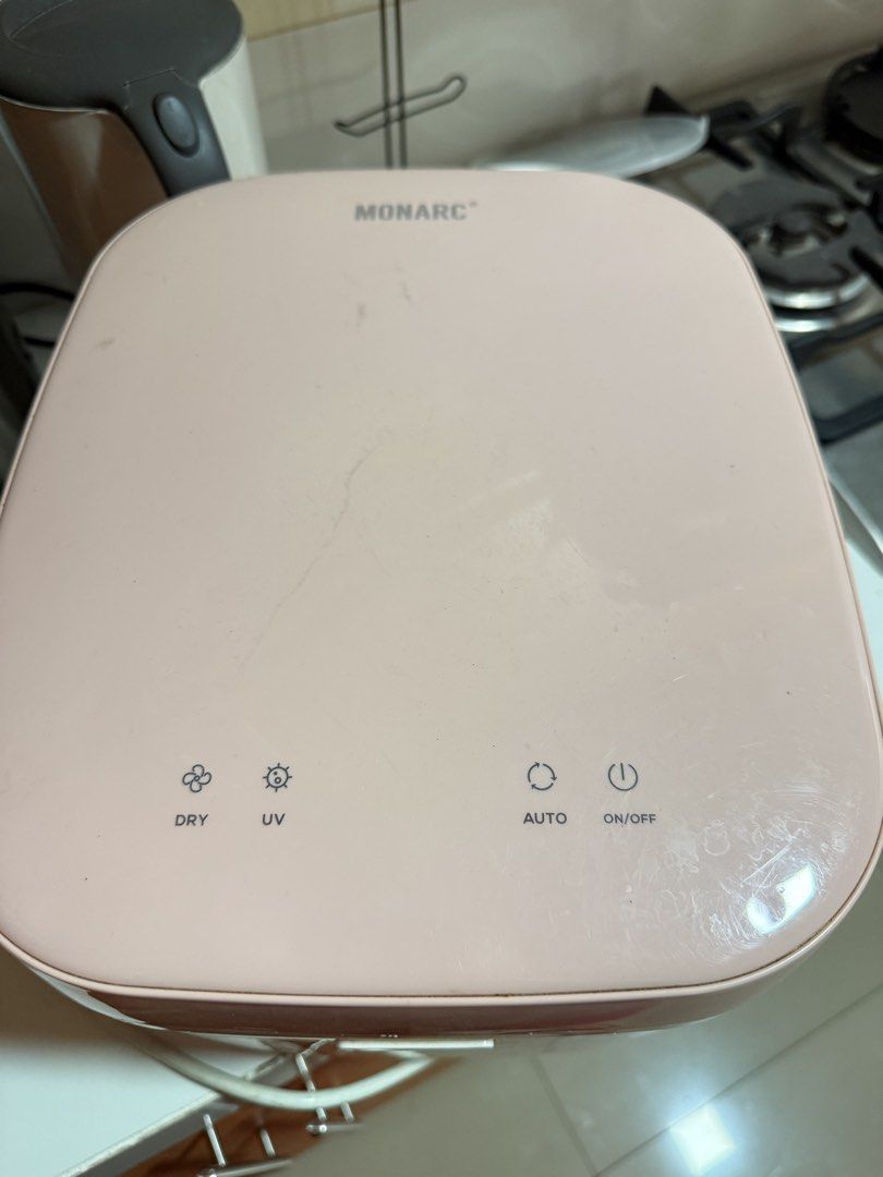Monarc UV Sterilizer (Category: Breastfeeding & Bottle Feeding) located in Paranaque City. Submitted by anony26 (Listing ID 1437109174, Image 1). Description: - Monarc sterilizer - Functions: Dry, UV, Auto, On/Off - Exterior: Pink - Interior: Stainless Steel - Good working condition - Easy-to-use control panel with indicator lights.