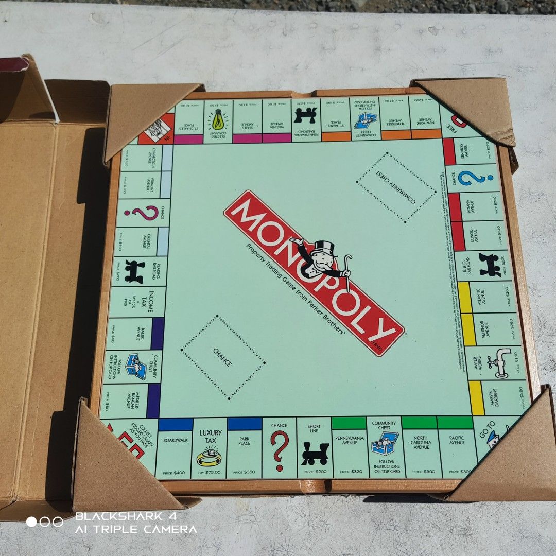 Monopoly and Scrabble Board Game Set (Category: Board Games & Puzzles) located in Bugallon. Submitted by ariel013 (Listing ID 1437054569, Image 2). Description: - Includes Monopoly, Scrabble, Chess, Checkers, Dominoes, and Poker Dice - Solid wood cabinet - Contains game boards, pieces, dice, and accessories - Great for family game nights and gatherings.