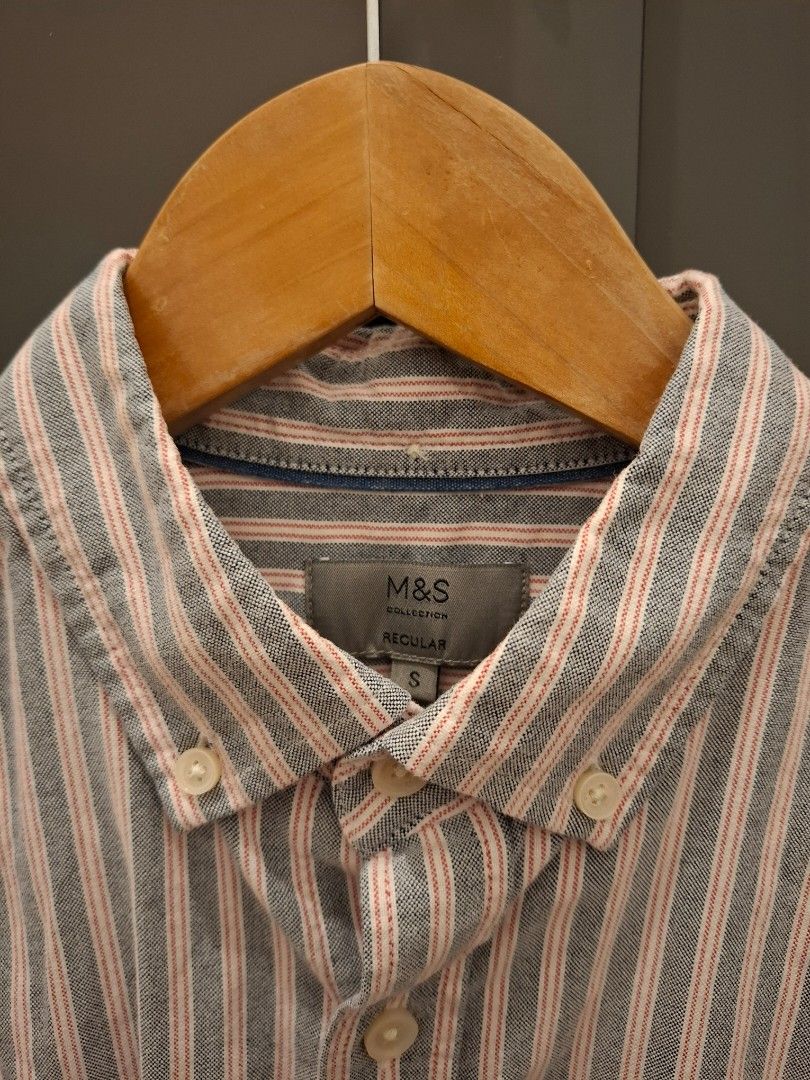 M&S Regular Fit Striped Shirt (Category: Tshirts & Polo Shirts ) located in Las Pinas. Submitted by acrc_ph (Listing ID 1437021917, Image 2). Description: - M&S Regular Fit Shirt - Size: S - Features a striped pattern - Long sleeves - Button-down design - Classic collar - Buttoned cuffs - Suitable for casual and smart casual occasions.