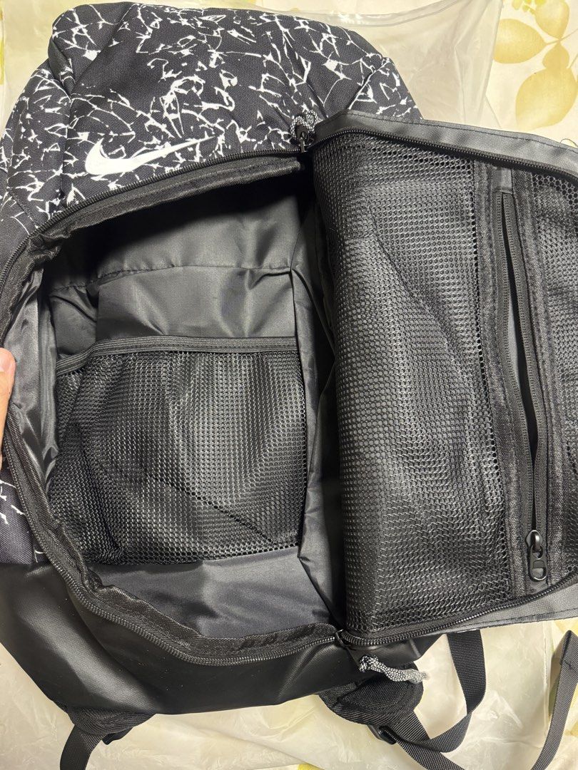 Nike Elite Pro Backpack (Category: Backpacks) located in Valenzuela. Submitted by fairythrift (Listing ID 1437118679, Image 3). Description: - Nike Elite Pro Backpack - Black and white pattern - Multiple compartments (main, side pockets) - Padded back for comfort - New and unused - Includes Nike tag.