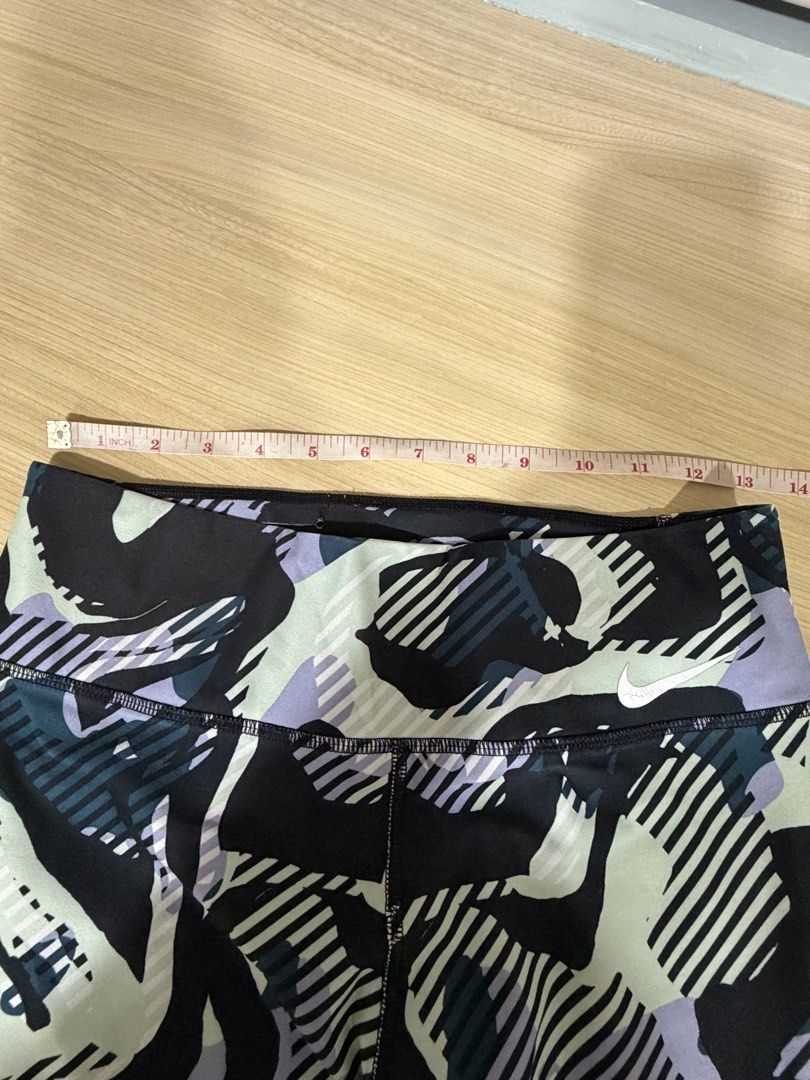 Nike Legend Printed Cropped Leggings (Category: Activewear) located in Mandaluyong City. Submitted by jpc0708 (Listing ID 1437135385, Image 3). Description: - Nike Legend cropped leggings - Size: M - Unique printed design - High waistband - Nike logo - Dri-FIT technology - Inseam: ~27 inches - Made with recycled materials.