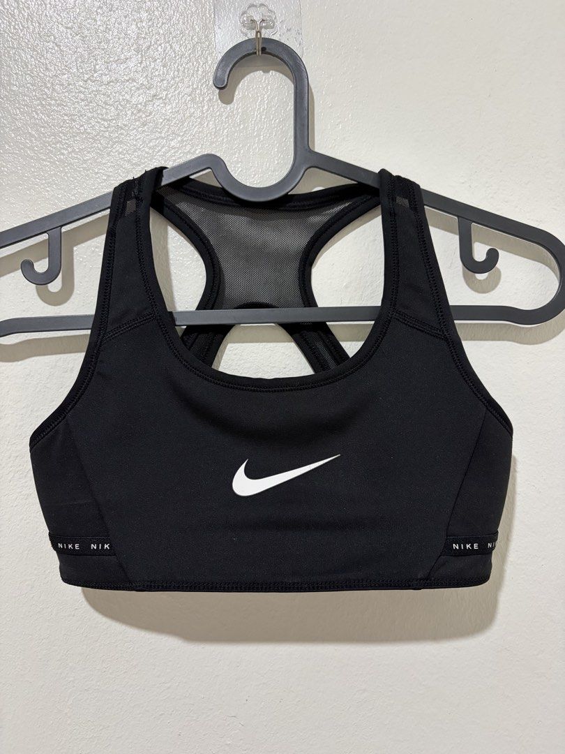 Nike Sports Bra (Category: Activewear) located in Quezon City. Submitted by rivers_ (Listing ID 1437095696, Image 1). Description: Black Nike sports bra • Reversible • size: xs • barely used • with flaw on the nike logo • no pads • no ww •rfs: does not fit me anymore.
