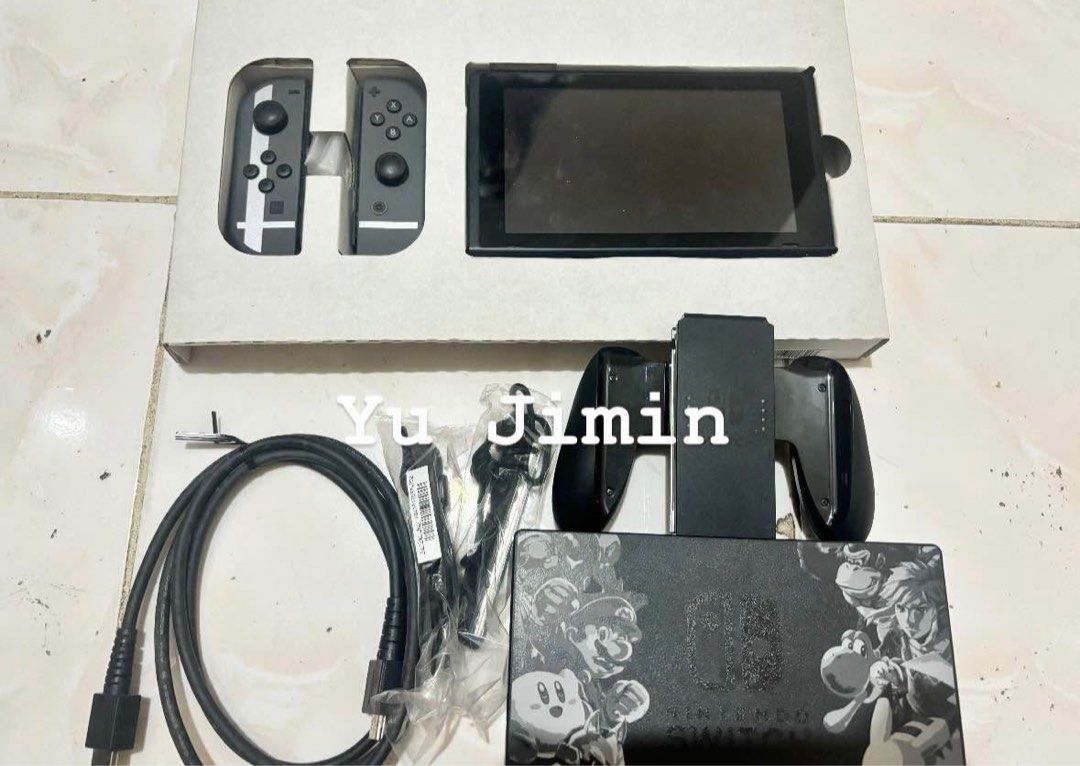 Nintendo Switch Super Smash Bros. Ultimate Edition | COMPLETE INCLUSION EXCEPT CHARGER!! (Category: Nintendo) located in Manila. Submitted by karinaaaaaaa2000 (Listing ID 1437166151, Image 2). Description: - Nintendo Switch Super Smash Bros. Ultimate Edition - Includes console, unique Joy-Cons, dock, and all necessary cables - Comes with Super Smash Bros. Ultimate game download - Joy-Cons feature a unique design - EVERYTHING IS COMPLETE EXCEPT CH