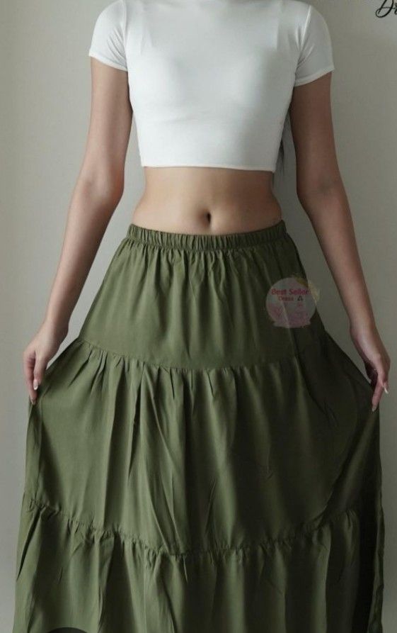 Olive Green Tiered Maxi Skirt (Category: Skirts) located in Dagupan City. Submitted by t00tsy (Listing ID 1437175130, Image 3). Description: !! SF Shouldered by Buyer !! - Olive green maxi skirt - M-L - Tiered design - Elastic waistband - No pockets (just an example pic) - Flowy silhouette - offers not lower than ₱150 -last pic color is innacurate MOP: Gcash MOD: J&T pm for more info, pic etc..