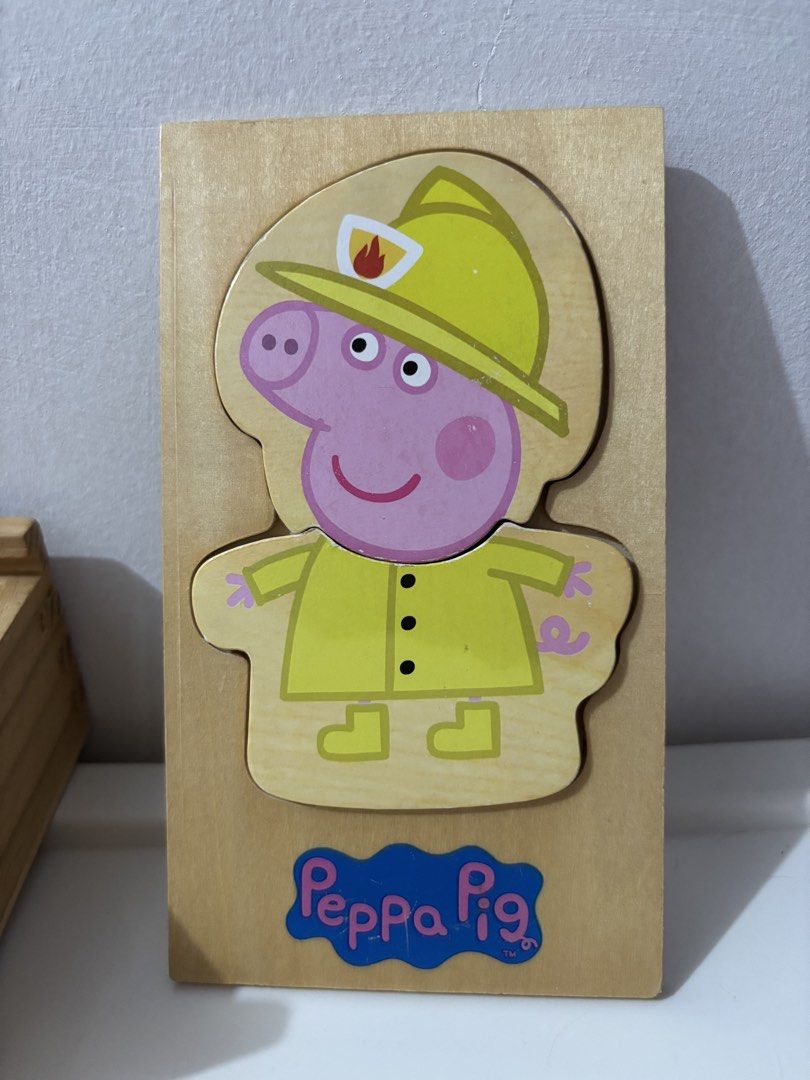 Peppa Pig Dress Up Puzzle (Category: Kids Toys) located in Bulacan. Submitted by lmsdeclutteringcorner (Listing ID 1437024952, Image 2). Description: - Peppa Pig Dress-Up Puzzle Set - Includes wooden box, wooden figure, and clothing pieces. - Features various outfits for Peppa Pig. - Dress Peppa as a firefighter and more! - Encourages creativity and imaginative play. - Fun and engaging toy for young children. -incomplete puzzle pieces -excellent 