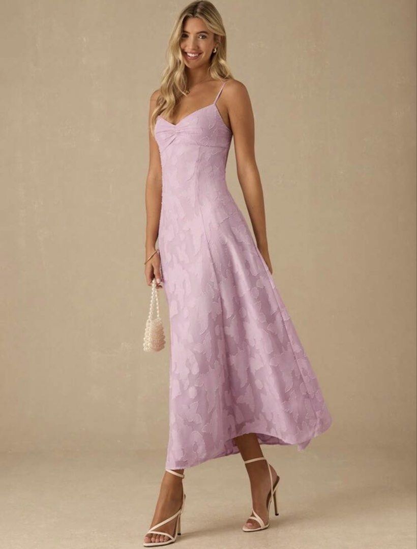 Pink Midi Dress (Category: Dresses) located in Manila. Submitted by jdddecluttersss (Listing ID 1437140047, Image 2). Description: - Lavender midi dress - Sweetheart neckline - Delicate spaghetti straps - Open back design - Subtle textured pattern - Flowing skirt - Perfect for special occasions.