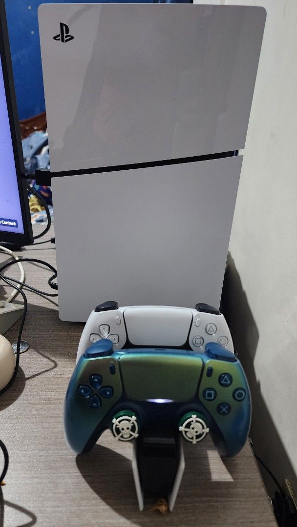 PlayStation 5 Console (Category: PlayStation) located in Lipa City. Submitted by rvdecena21 (Listing ID 1437205043, Image 1). Description: - PS5 Slim Disc - Bought Feb 2025 - 2 Dual Sense 5 Controllers - Chroma Teal DS5 bought from Amazon (USD 80) - 3 Physical Games - 6 Digital Games Game Titles: PHYSICAL Split Fiction Sonic Origins Tekken 8 GTA V DIGITAL Red Dead Redemption Red Dead Redemption 2 NBA 2K25 Astro Bot It Takes Two Garten of Banban N