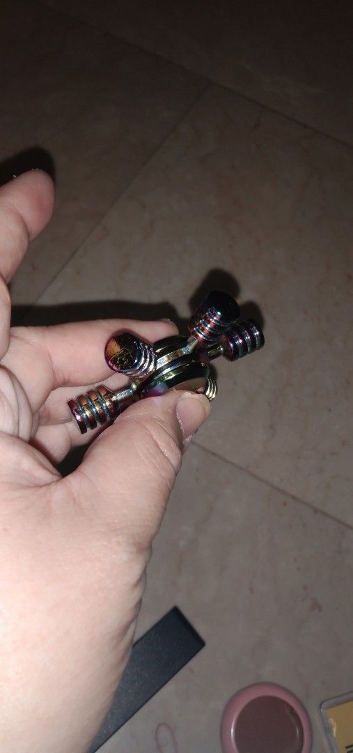 Rainbow Metal Fidget Spinner (Category: Action & Battle Toys) located in Quezon City. Submitted by eidorableshop (Listing ID 1437192111, Image 1). Description: - Rainbow colored fidget spinner - Six-arm metal design - Smooth spinning action - Great for stress relief - Durable construction.
