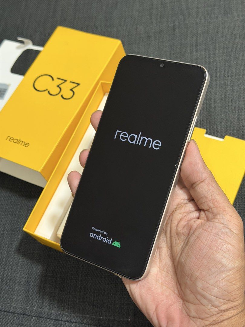 realme c33 (Category: Realme) located in Makati City. Submitted by bloggerrific (Listing ID 1437179263, Image 3). Description: realme c33. Sandy Gold. No issue. Almost new Complete box. Small cable and charger. Used by my mom for couple of months (Just facebook and messenger)..