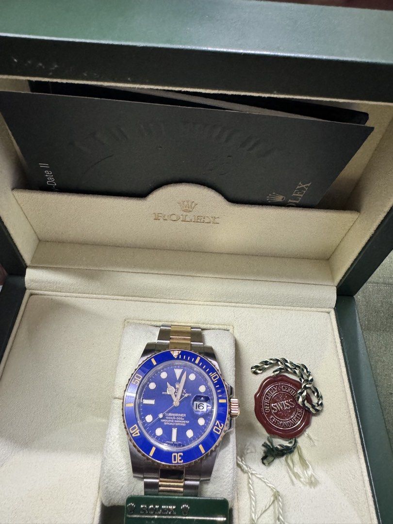 Rolex Submariner Blue Dial Two-Tone (Category: Luxury Watches) located in Manila. Submitted by nash.alawiya121293 (Listing ID 1437155396, Image 3). Description: - 2010 model - Rolex Submariner - Blue dial - Two-tone stainless steel and gold bracelet - Includes original box, warranty card, and booklets - Date display - Brand new in original packaging.