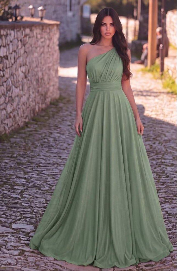 Sage Green One-Shoulder Maxi Dress (Category: Dresses) located in Pasig City. Submitted by nixtn (Listing ID 1437169461, Image 1). Description: WORN ONCE - Sage green maxi dress - One-shoulder design - Fitted bodice and defined waist - Floor-length skirt - Lightweight, flowing fabric - Ideal for formal events and special occasions.