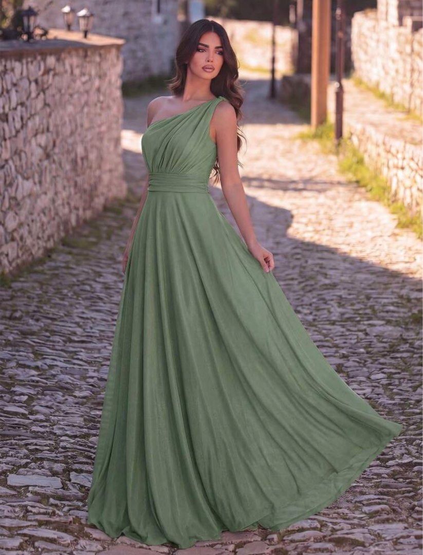 Sage Green One-Shoulder Maxi Dress (Category: Dresses) located in Pasig City. Submitted by nixtn (Listing ID 1437169461, Image 2). Description: WORN ONCE - Sage green maxi dress - One-shoulder design - Fitted bodice and defined waist - Floor-length skirt - Lightweight, flowing fabric - Ideal for formal events and special occasions.