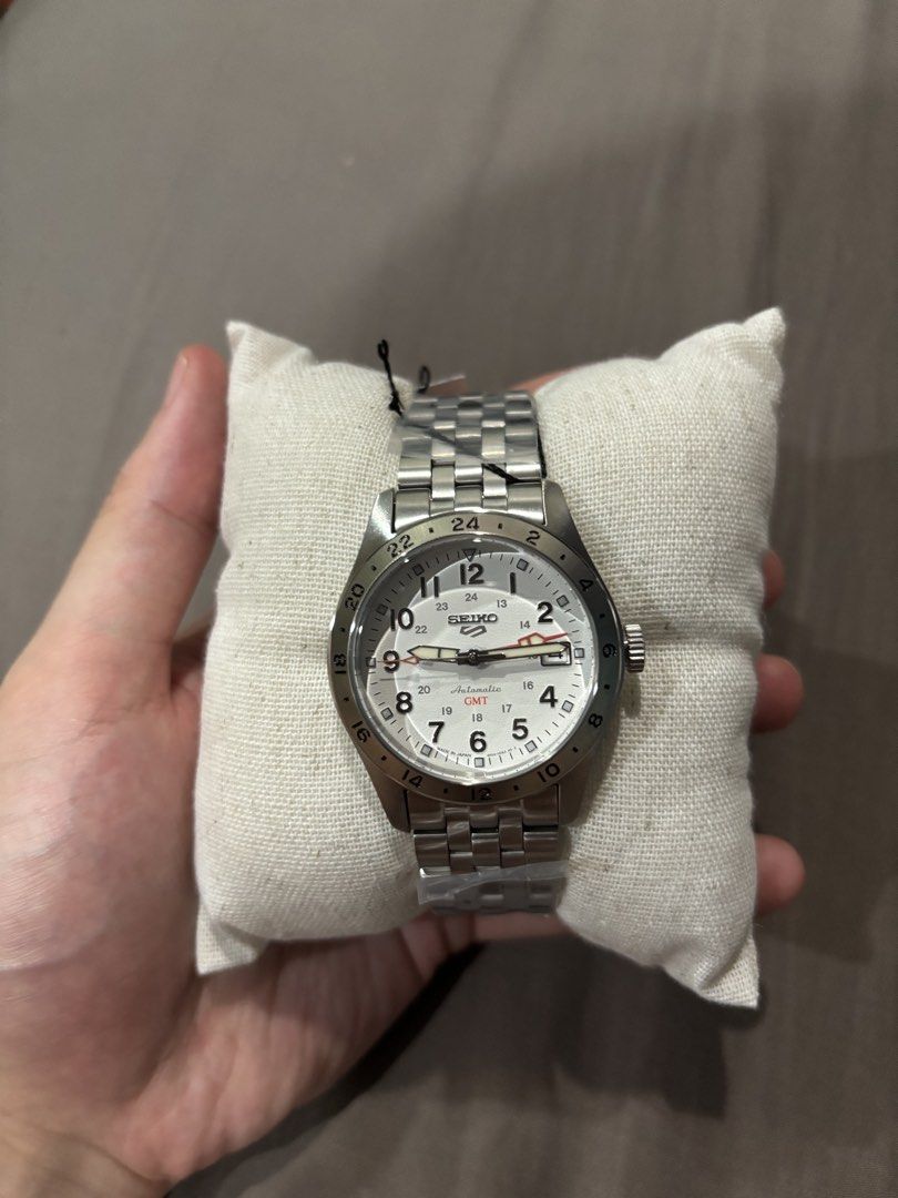 Seiko 5 Sports GMT Automatic Watch (Category: Luxury Watches) located in Manila. Submitted by josh_healy (Listing ID 1437091607, Image 2). Description: Brand new Seiko 5 Sports GMT SBSC009 “White Explorer” JDM Complete Set Inclusions of ✅Complete with box ✅Hangtag ✅Booklet ✅Warranty Card (3 years warranty) Diameter: 39.4mm Caliber: 4R34 Automatic with manual winding Power reserve: Approx. 41 hrs. Dual time display function Date display Hardlex Cr
