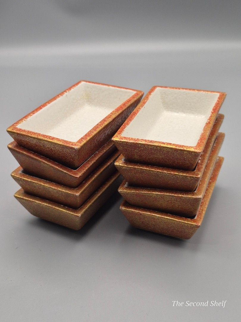 Set of 8 Ceramic Rectangular Dipping / Sauce Dishes (Category: Other Kitchenware & Tableware) located in Santa Rosa. Submitted by thesecondshelf (Listing ID 1437178225, Image 1). Description: Set of 8 Ceramic Rectangular Dipping / Sauce Dishes ₱650 Details: • Set of 8 ceramic rectangular dishes • Rustic earth-tone exterior with cream glazed interior • Ideal for soy sauce, condiments, side dishes, spices, or small servings • Stackable design for e