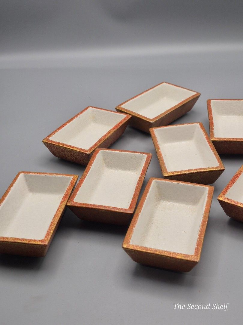 Set of 8 Ceramic Rectangular Dipping / Sauce Dishes (Category: Other Kitchenware & Tableware) located in Santa Rosa. Submitted by thesecondshelf (Listing ID 1437178225, Image 2). Description: Set of 8 Ceramic Rectangular Dipping / Sauce Dishes ₱650 Details: • Set of 8 ceramic rectangular dishes • Rustic earth-tone exterior with cream glazed interior • Ideal for soy sauce, condiments, side dishes, spices, or small servings • Stackable design for e