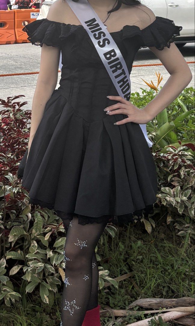 SHEIN Black Off-Shoulder Ruffle Dress (Category: Dresses) located in Quezon City. Submitted by jomarch5 (Listing ID 1437193729, Image 3). Description: - Black off-shoulder ruffle dress - Size: XS-Small - My height: 5’2 - Waistline: 25 - Bust: 32 - Original price: 1,554 - Only worn ONCE - Perfect for Halloween, concerts or special events - Features a flared skirt - Fitted bodice - Dress only (tights and shoes not included) .