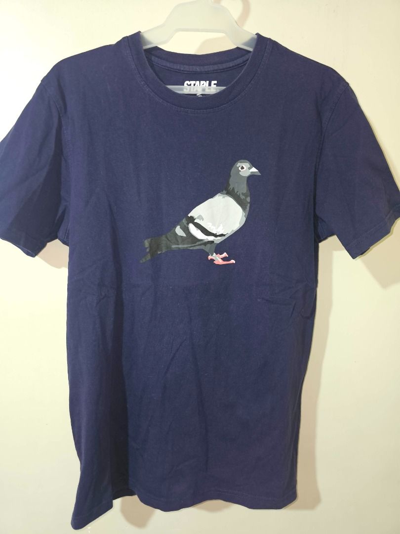 Staple Pigeon Graphic Tee - Medium Dark Blue (Category: Tshirts & Polo Shirts ) located in Pasig City. Submitted by cosmicdeer_01 (Listing ID 1437138457, Image 1). Description: W: 19 in L: 27 in Meetups: SM Marikina, Ayala Malls Feliz, Gateway Cubao, SM Megamall.