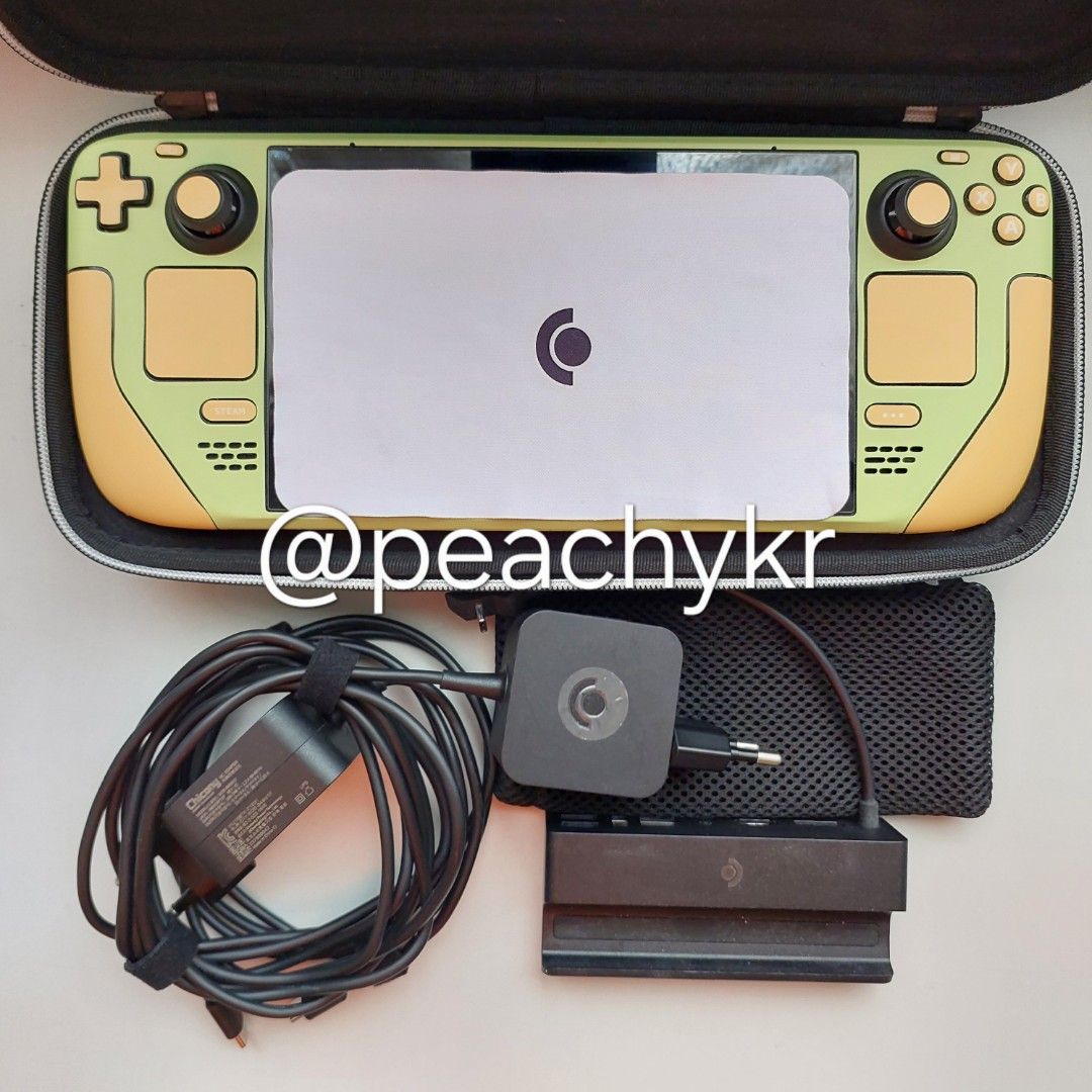 Steamdeck OLED 1TB with Dock (Category: Others) located in San Juan City. Submitted by peachykr (Listing ID 1437044417, Image 1). Description: Steamdeck OLED Storage: 1 TB Includes the original case, pouch and charger. Bundled with Steamdeck dock and charger, worth ~₱6,000. New battery from iFixit installed in December 2025, worth ~₱5,000. Earphone jack doesn't seem to work or I don't have a proper earphone tester. No other issues noted. Only ori