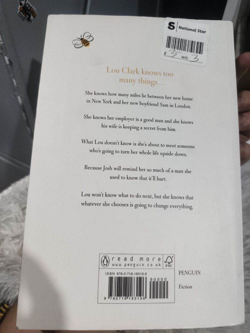 Still Me by Jojo Moyes (Category: Storybooks) located in Cabuyao City. Submitted by chaptersandwonders143 (Listing ID 1437116666, Image 2). Description: - "Still Me" by Jojo Moyes, large paperback edition. - Fiction novel published by Penguin. - Follows Lou Clark's journey in New York. - Features a bee sticker on the front cover. - Pages are clean and the spine is intact..