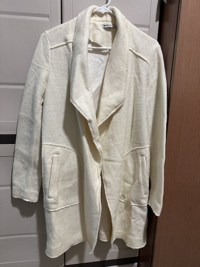 Stradivarius Cream White Trench Coat (Category: Coats, Jackets and Outerwear) located in Manila. Submitted by pmrshops1 (Listing ID 1437063793, Image 1). Description: - Stradivarius cream coat - Size: S - Features a shawl collar - Two front pockets - Textured fabric - Longline design - Great for layering - Versatile style.