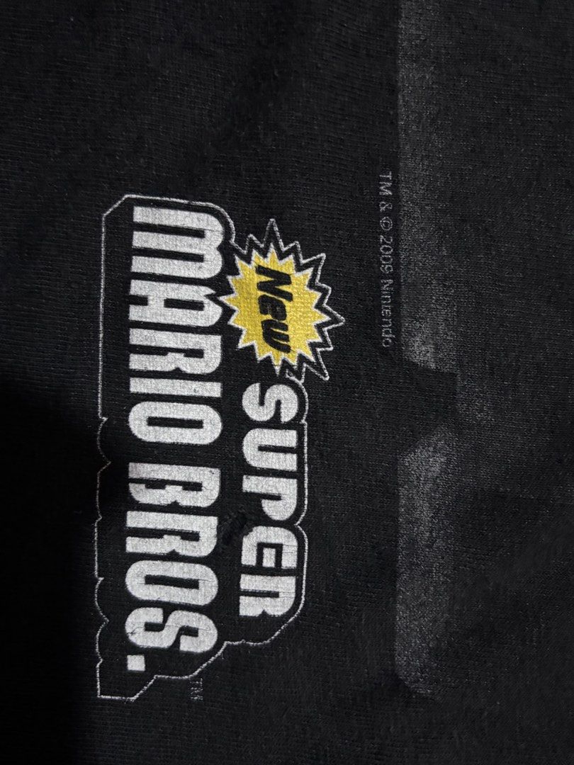 Super Mario Bros Promo Shirt (Category: Tshirts & Polo Shirts ) located in Noveleta. Submitted by nep21 (Listing ID 1437070604, Image 3). Description: Super Mario Bros Promo Tee Size M 19.5”W x26.5”L Good Condition.Crack print Selling for 1,500 pesos Cavite location.