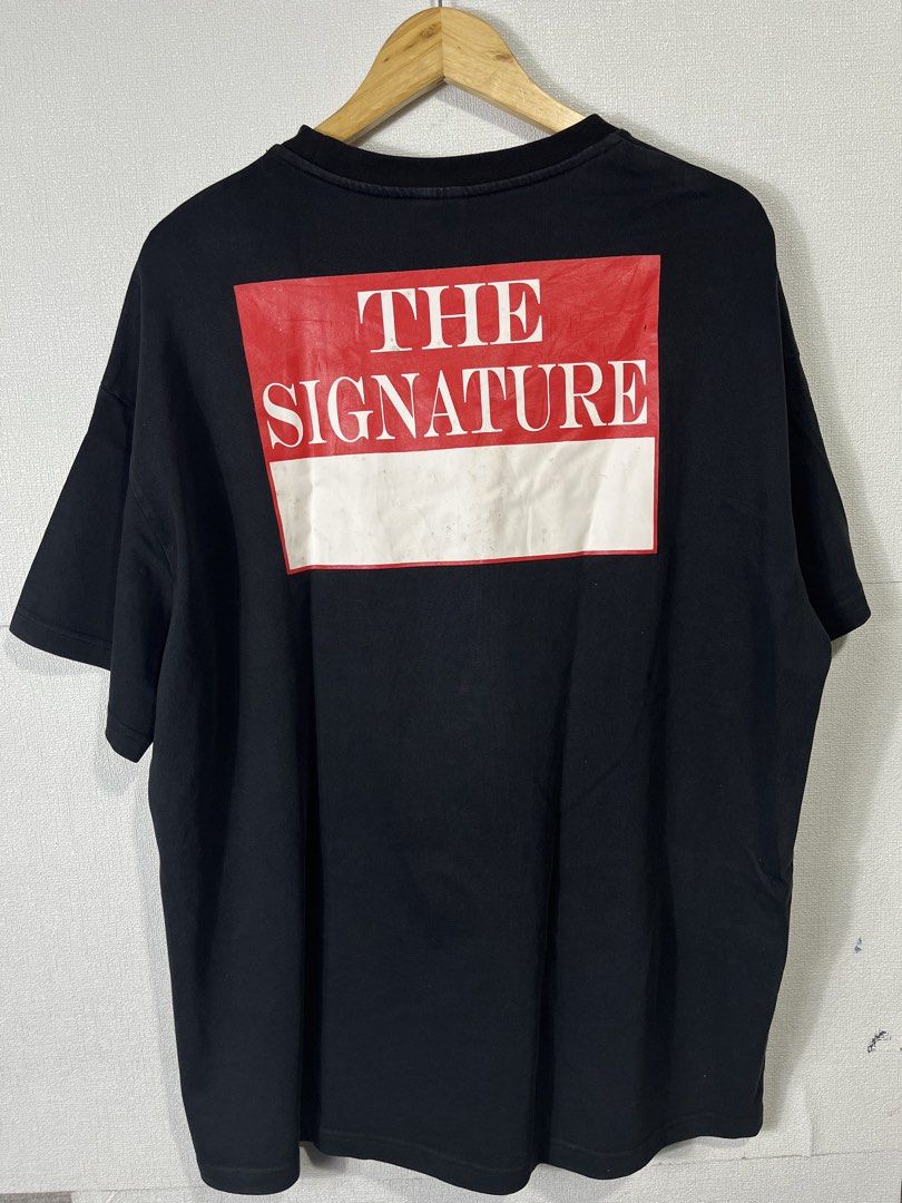 Supreme The Signature Tee Black Medium (Category: Tshirts & Polo Shirts ) located in Baguio. Submitted by cosmicgem_21b525 (Listing ID 1437169498, Image 3). Description: - Supreme black t-shirt - Features "The Signature" graphic on the back - Red rectangular design with white text - Size: XXL - Material: Pre-shrunk cotton - Style: Crew neck, short sleeves -24x30.
