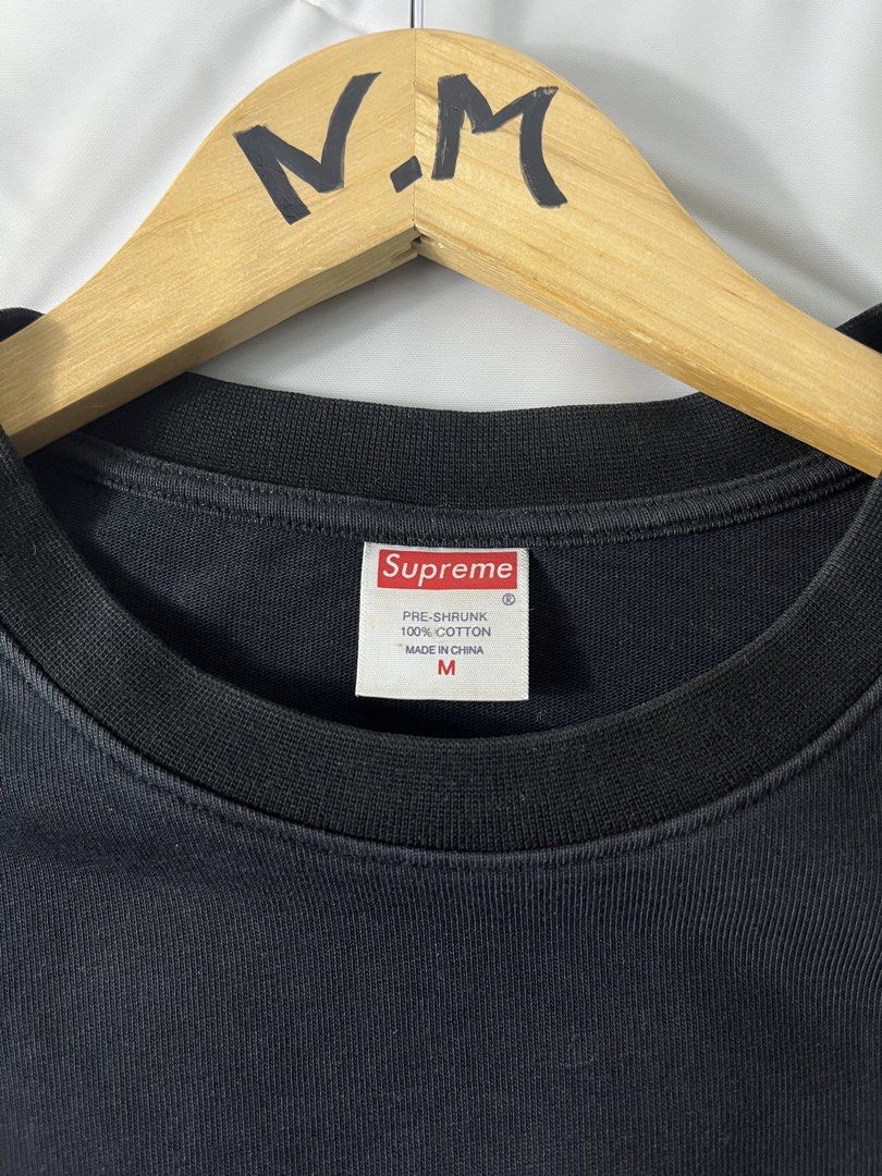Supreme The Signature Tee Black Medium (Category: Tshirts & Polo Shirts ) located in Baguio. Submitted by cosmicgem_21b525 (Listing ID 1437169498, Image 1). Description: - Supreme black t-shirt - Features "The Signature" graphic on the back - Red rectangular design with white text - Size: XXL - Material: Pre-shrunk cotton - Style: Crew neck, short sleeves -24x30.