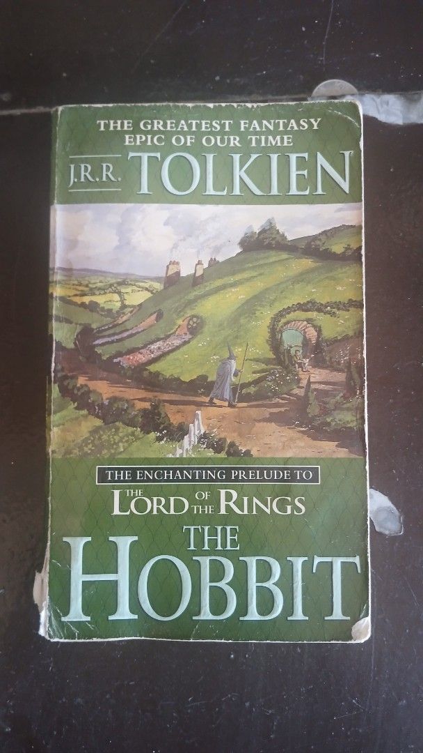 The Hobbit by J.R.R. Tolkien (Category: Storybooks) located in Muntinlupa City. Submitted by skramzgaze2005 (Listing ID 1437054649, Image 1). Description: - The Hobbit by J.R.R. Tolkien - Paperback edition - The enchanting prelude to The Lord of the Rings - Back cover mentions the upcoming movie trilogy from New Line Cinema - Perfect for fans and collectors!.
